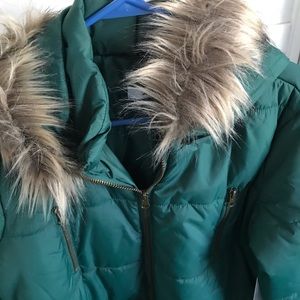 Long winter coat. Emerald colored with faux fur trim. Brand new